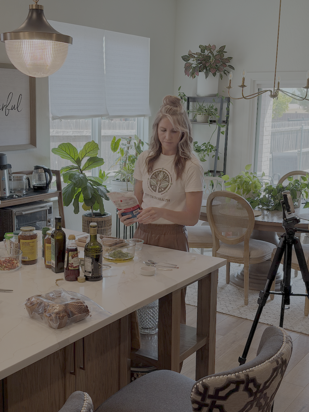 Paige Grellner helping prepare cilantro lime vinaigrette during the Truth in Health podcast