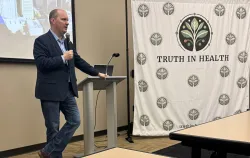 Jon Echols speaking at the Truth in Health February meeting in Oklahoma City discussing medical freedom and government policy.